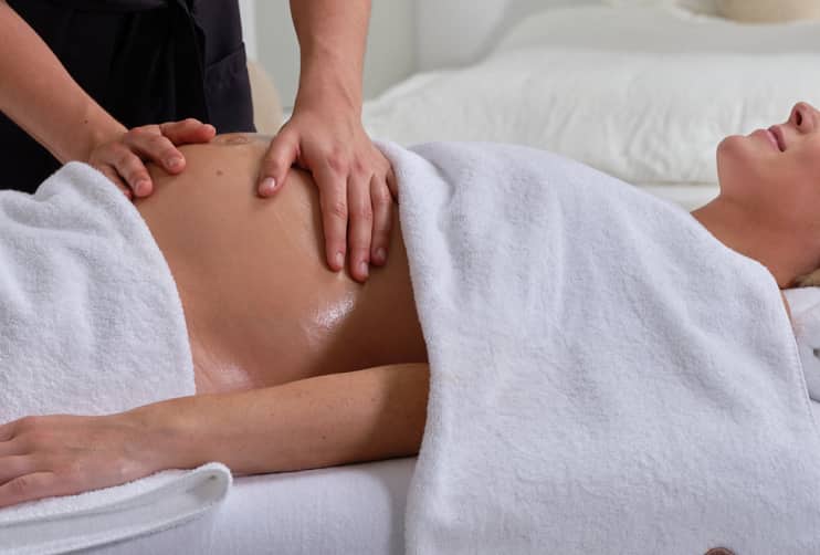 Woman getting prenatal massage