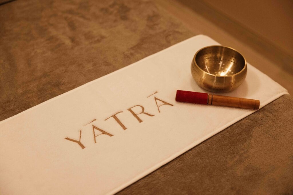 Premium branded spa collateral and material design for YĀTRĀ, highlighting COCON Group's meticulous attention to detail in white-label luxury brand creation.